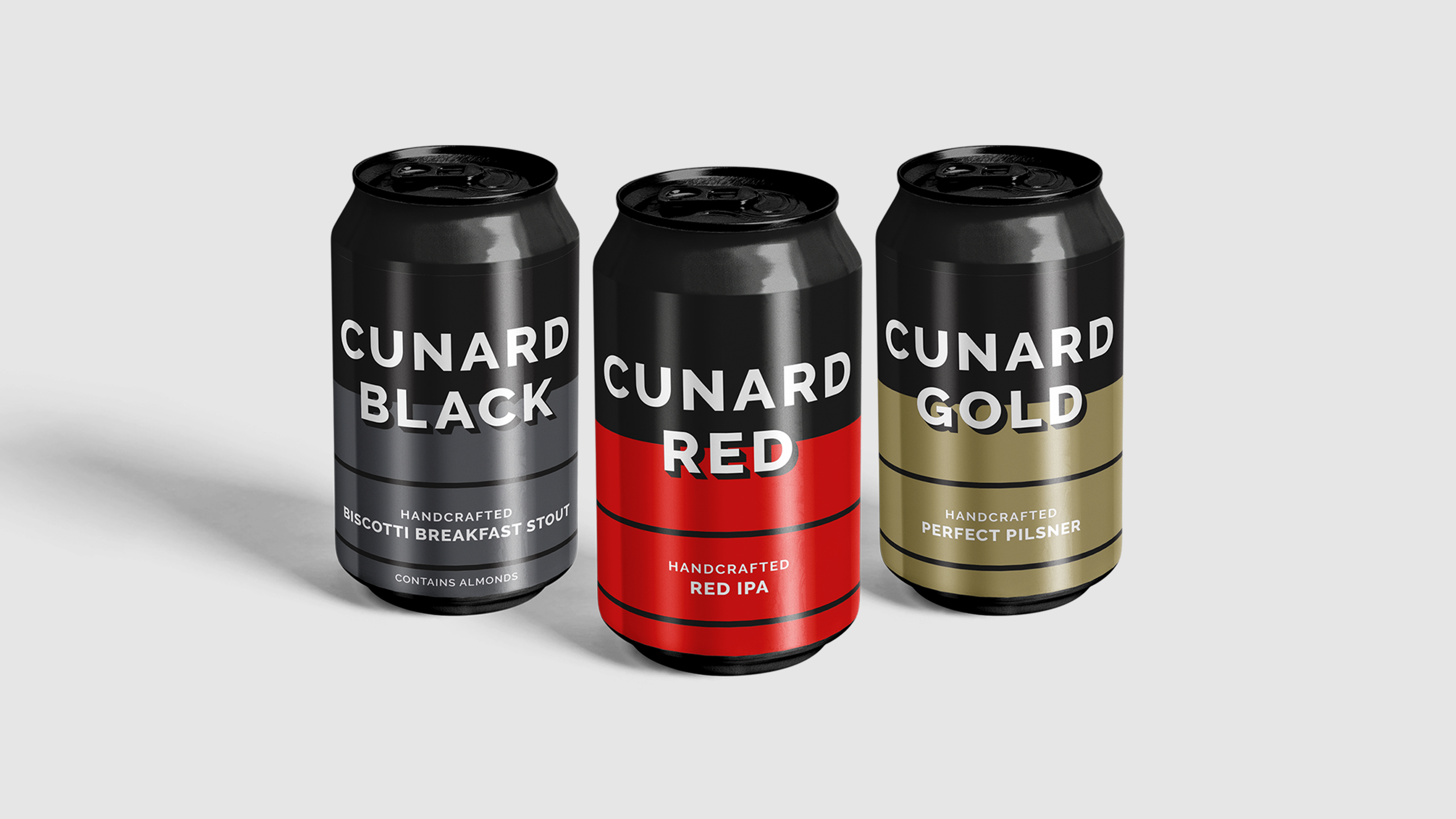 Cunard Black, Cunard Red and Cunard Gold beer cans standing side by side