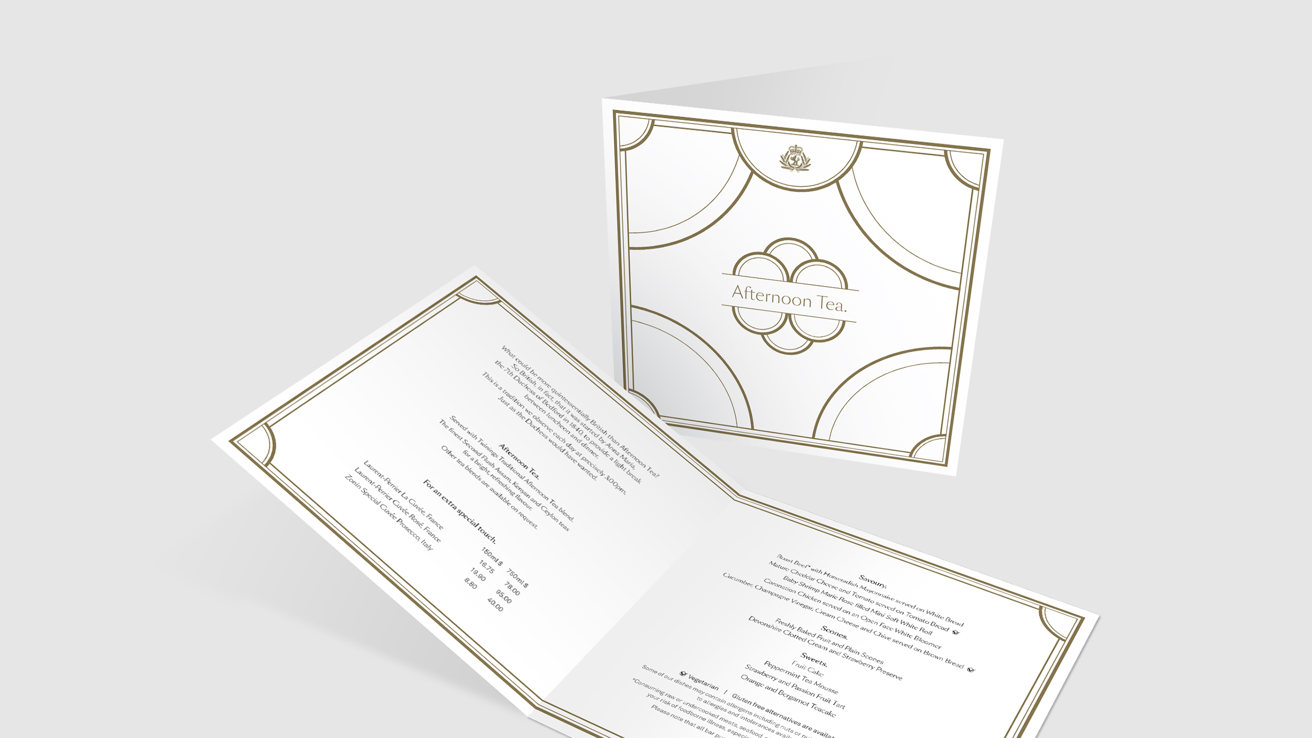 Afternoon Tea menu shown closed and opened to the savoury, scone and sweet listings