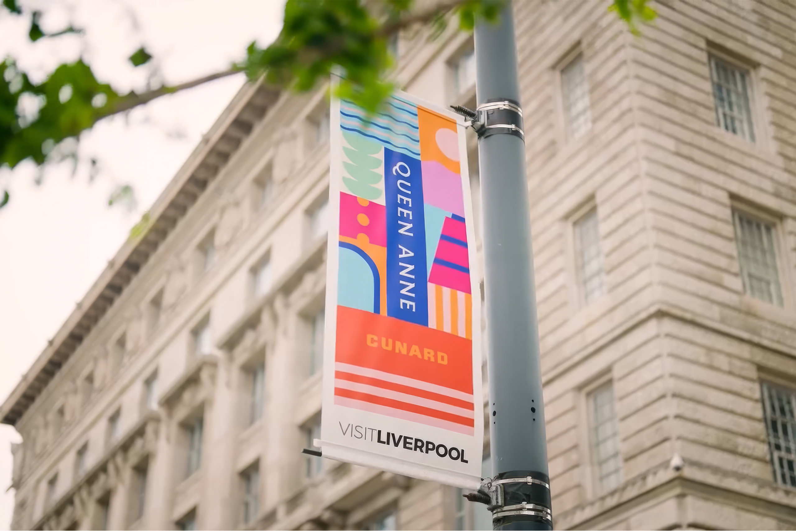 Queen Anne street banner on a lamp post at the Liverpool waterfront
