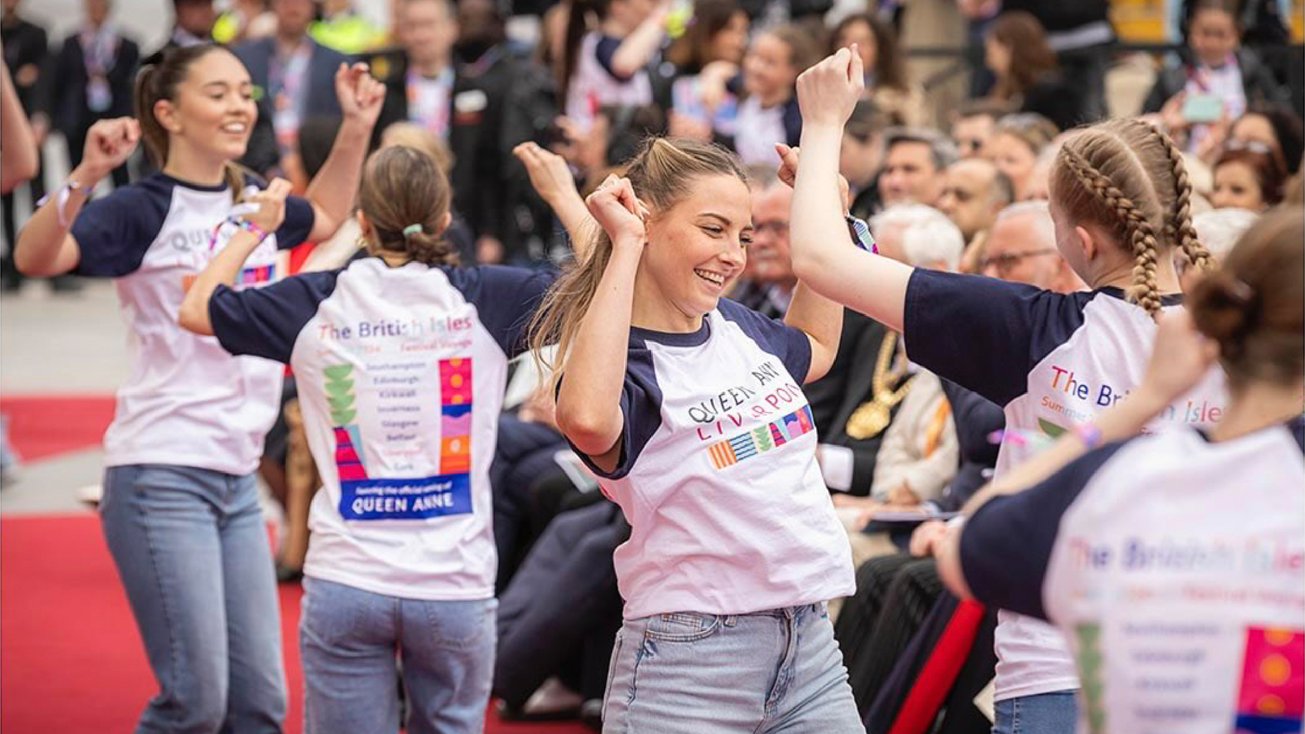 Dancers wearing Queen Anne Liverpool t-shirts at the ceremony